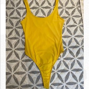 Unitard-madrag-yellow